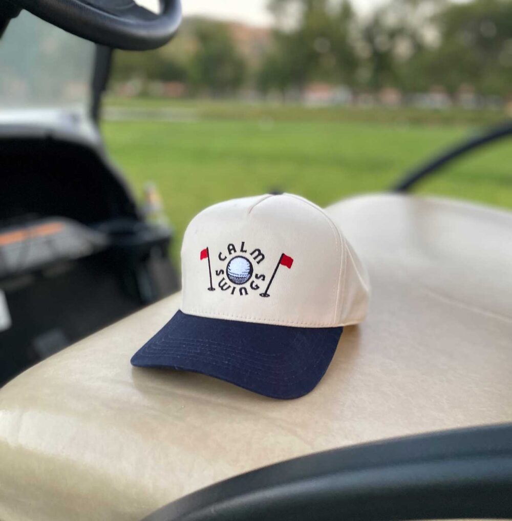 Tradition Golf hat on cart